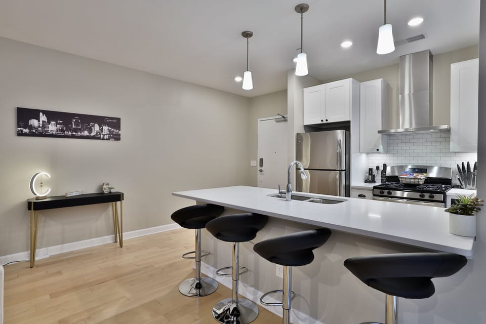 kitchen island with adjustable bar stools
