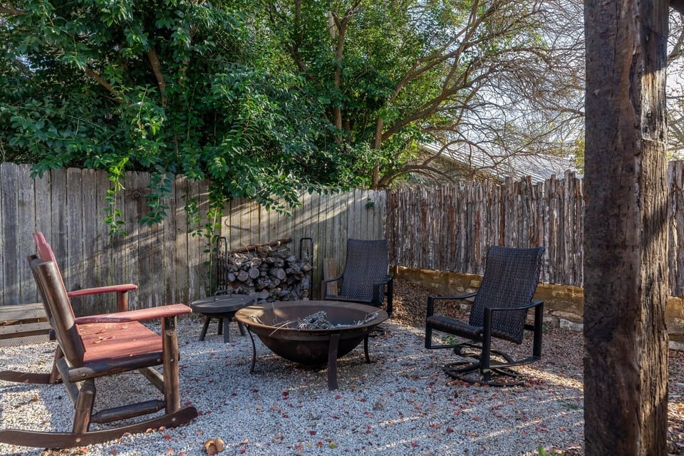 Firepit and grill area. Firewood provided.