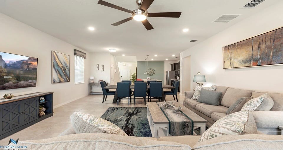 Comfortable living room with a large smart TV.