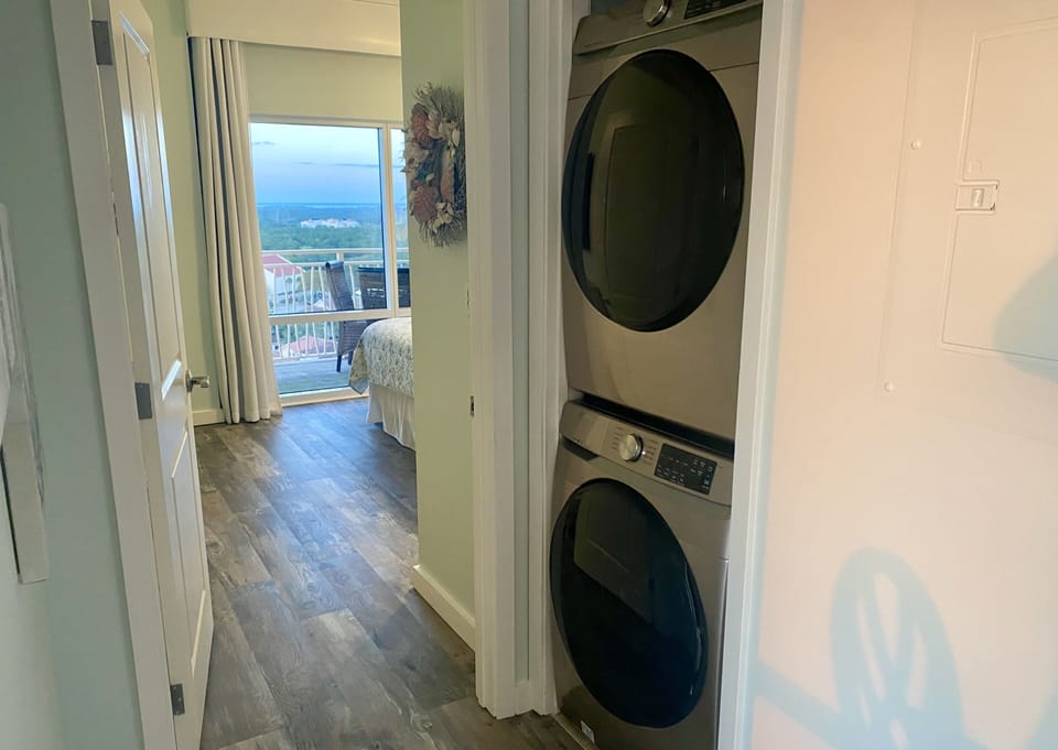 Brand new Samsung washer and dryer adjacent to the master bedroom. 