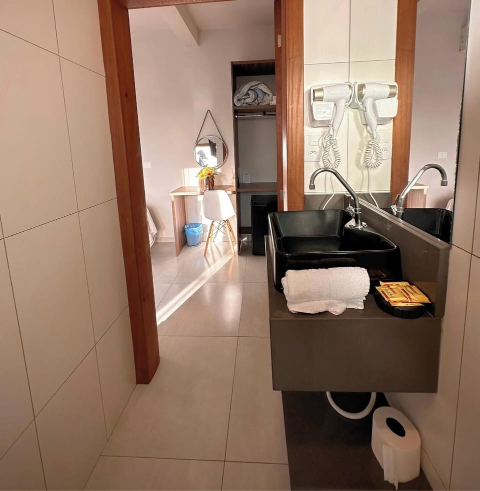 Superior Quadruple Room | Bathroom | Shower, hair dryer, towels, soap