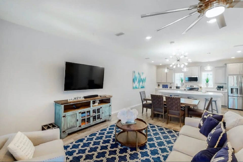 Open concept living, dining and kitchen provides space for the entire family