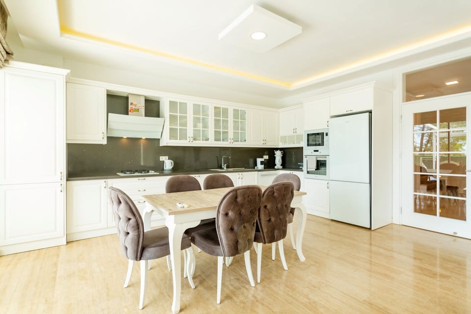 Elite Villa | Private kitchen | Coffee/tea maker, full-size fridge, microwave, oven