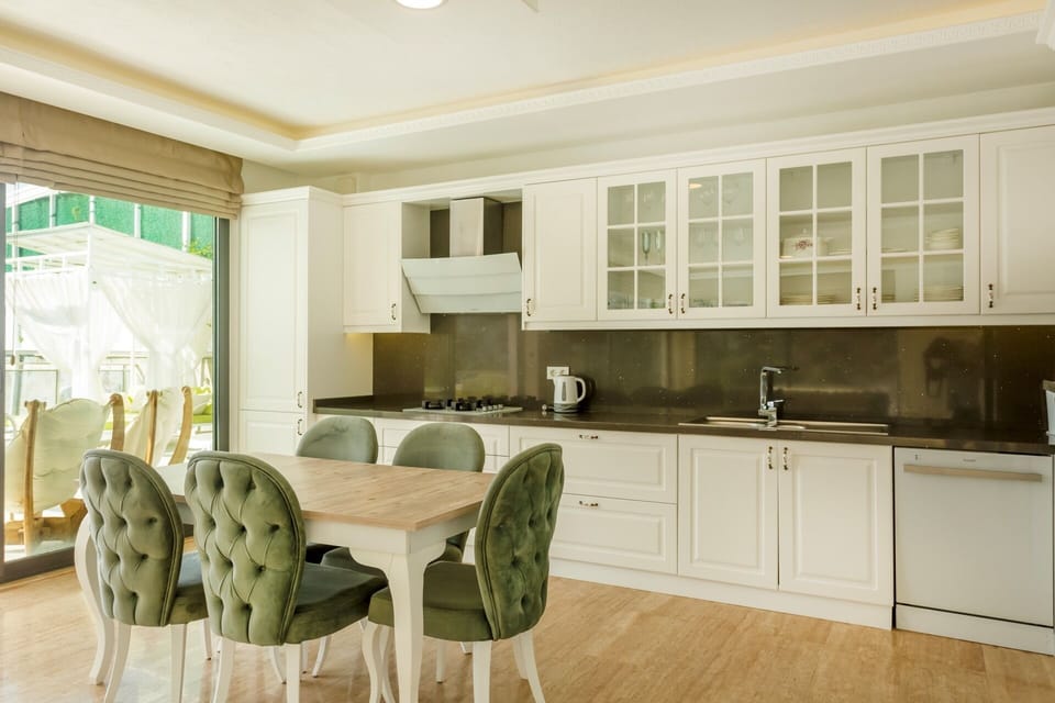 Exclusive Villa | Private kitchen | Coffee/tea maker, full-size fridge, microwave, oven