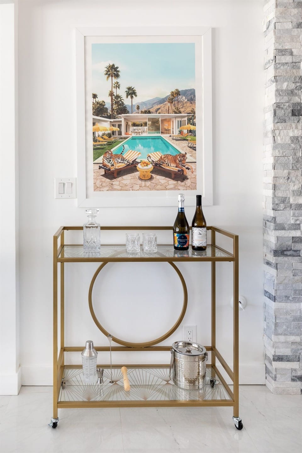 As dusk settles, gather at the gold bar cart to craft a cocktail and toast to another unforgettable day in the desert.