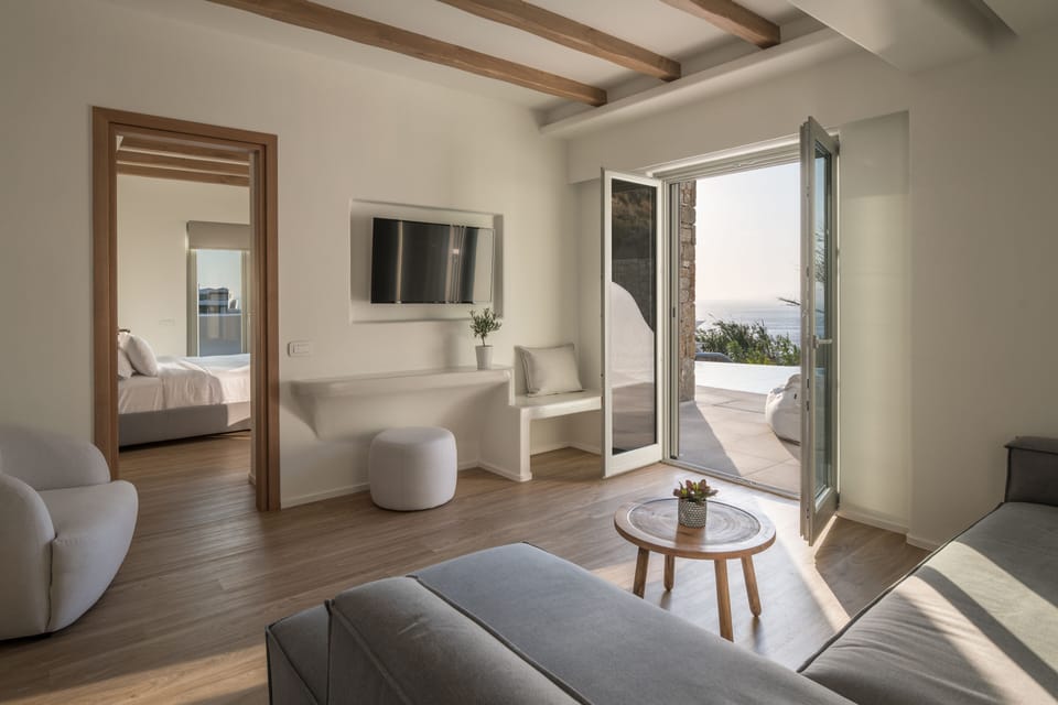 Honeymoon Suite with pool | Living area | 43-inch flat-screen TV with digital channels, TV