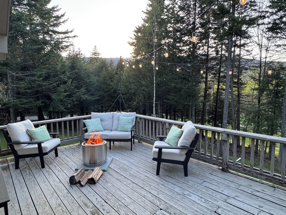 Enjoy outdoor lounging on the expansive deck (stove available spring/fall) 