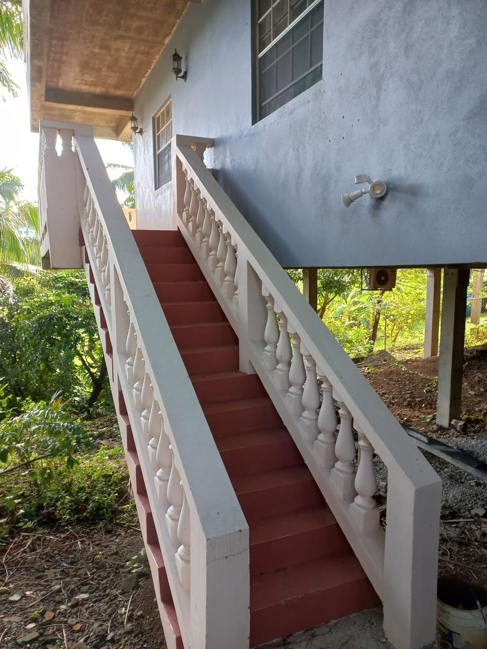 Staircase leading to front of apartment
