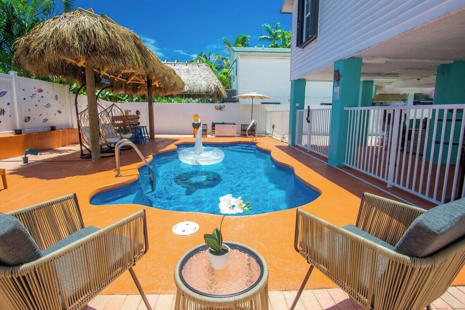 Blend yourself a frozen drink in a Tiki Cup and hangout by your own private salt water pool for the day with the family! Relax under the shade of the beautiful newly built Tiki Hut!