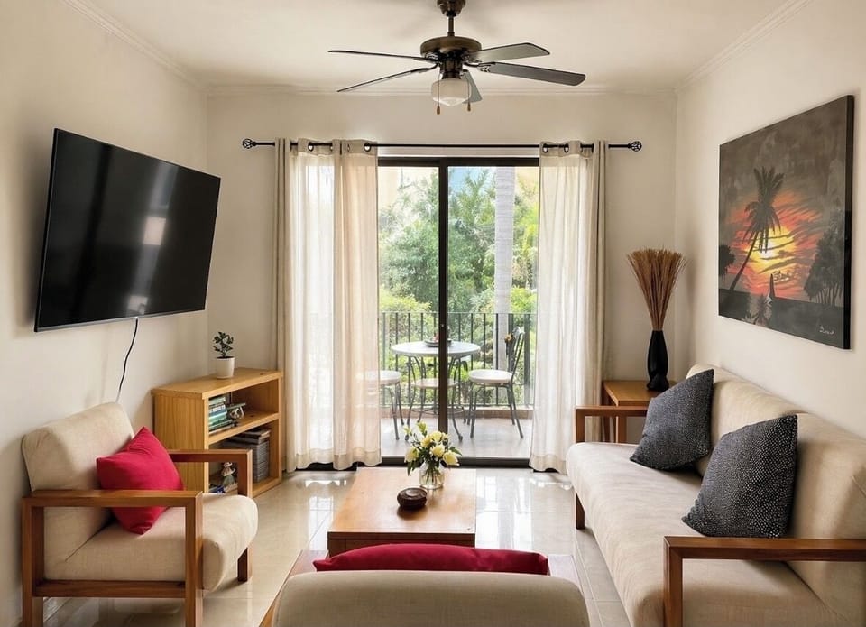Open concept unit with ample seating. Smart TV,  books or board games to enjoy.