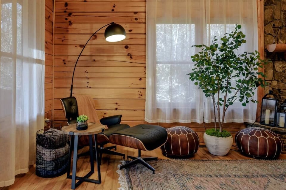 [LIVING ROOM] - The perfect lounging chair is waiting for you to sit back and enjoy reading a book, sipping your coffee, or just simply hanging out and relaxing.