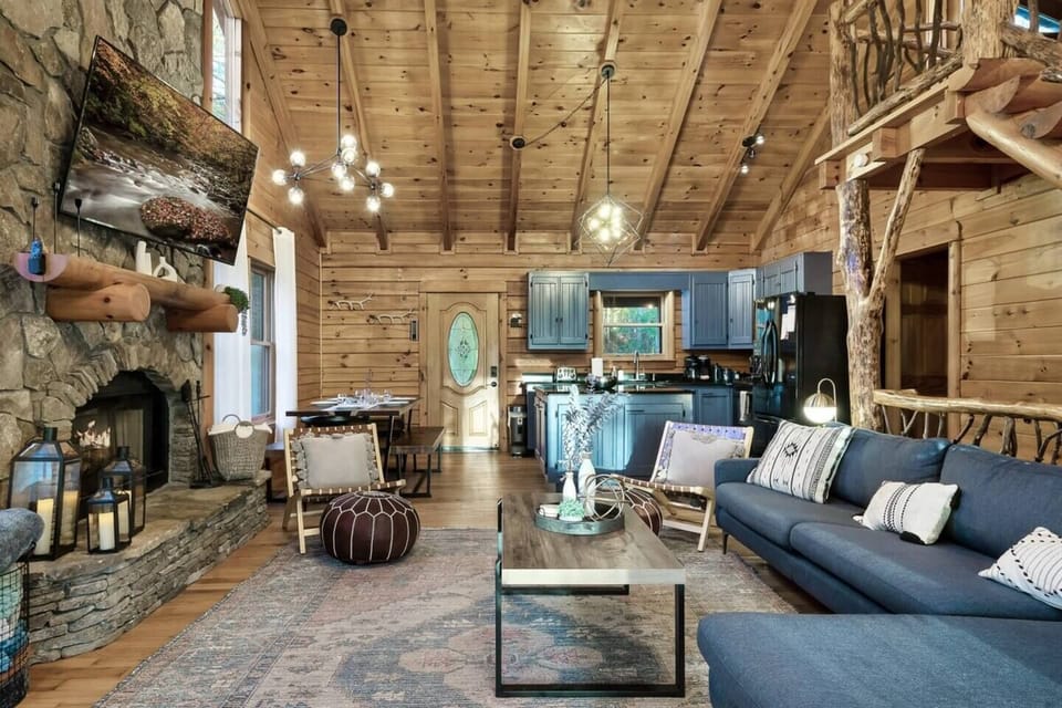 [GROUND FLOOR] - Sunday football, movies or just hanging out the main living area is open to the kitchen and the main level decks.