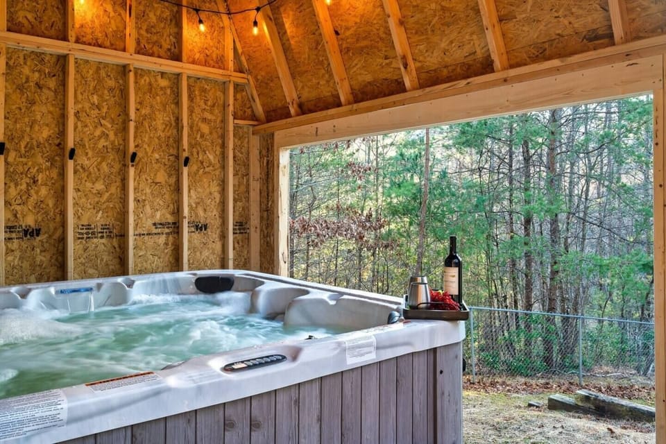 [BACKYARD] - Escape the elements, indulge in a 7-person hot tub. New decks extend the experience into the garden where fall colors surround you.