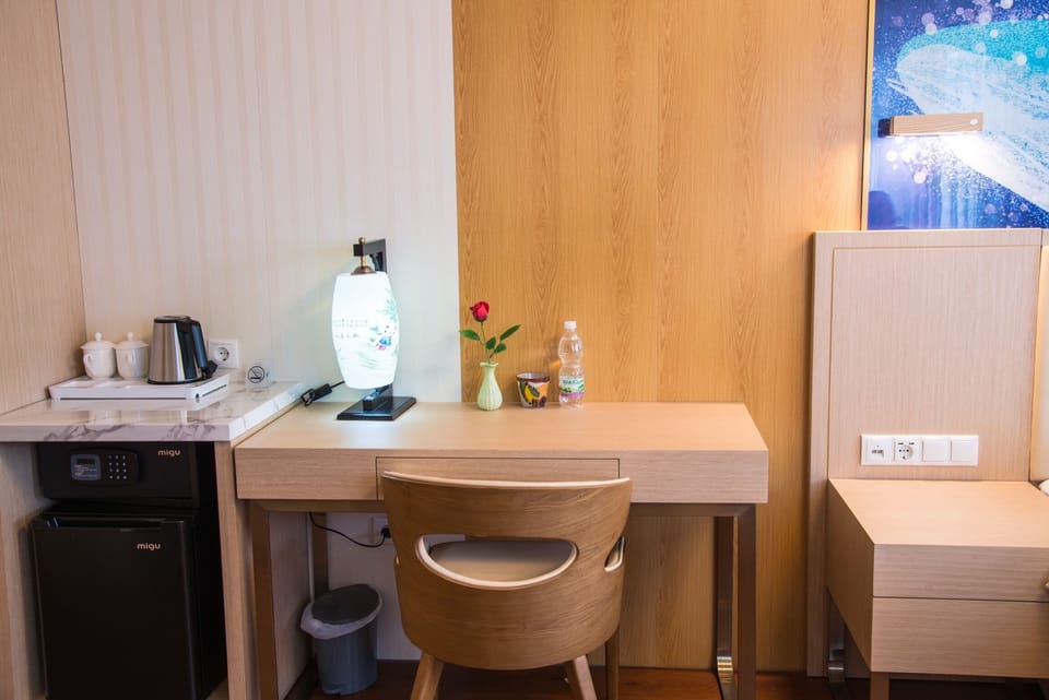 Triple Room | In-room safe, desk, laptop workspace, blackout drapes