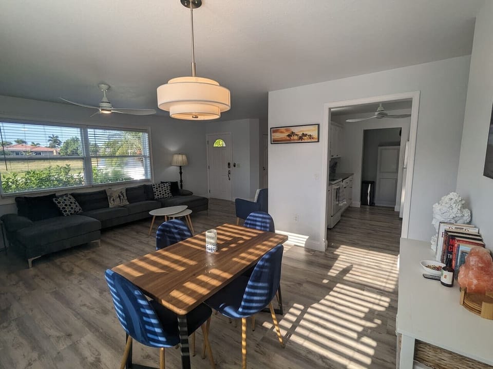 Dining Area, Living area, and kitchen in the background.