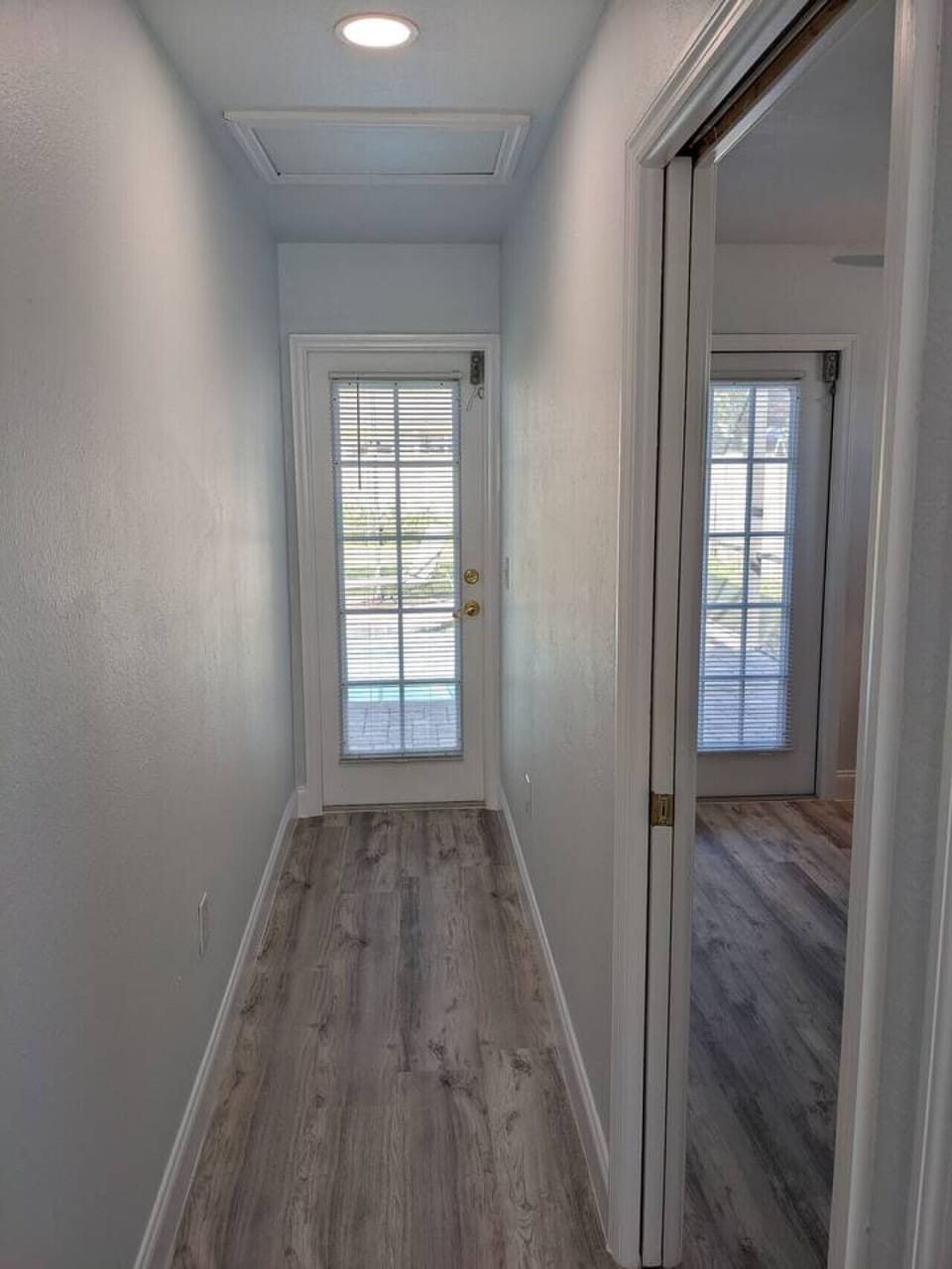 Hallway leading to the Screened in Pool area.