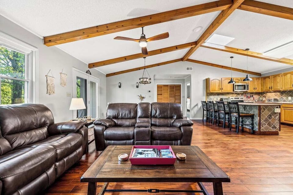 [Living Room] Open concept kitchen with adjoining living room and dining room