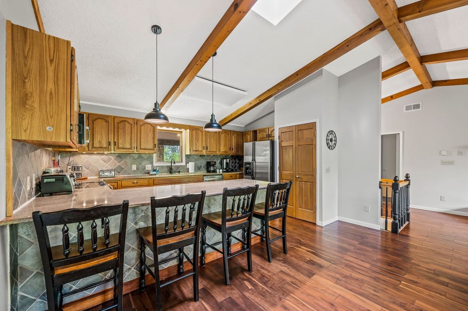 [Kitchen, Main Level] Open concept kitchen stocked with all cooking supplies