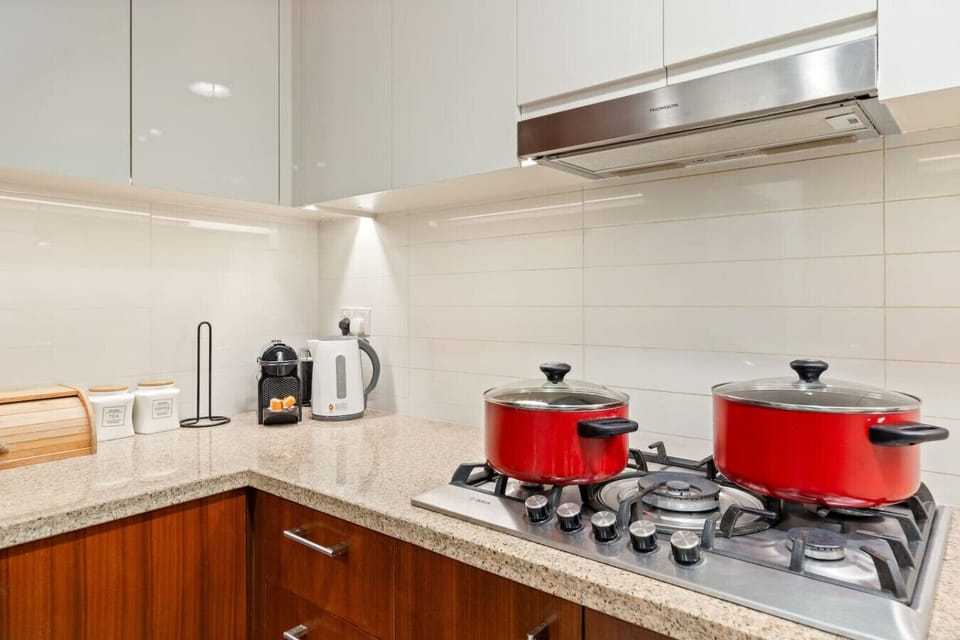 Gourmet Kitchen: Cook up a storm with modern appliances and stylish decor at your fingertips!