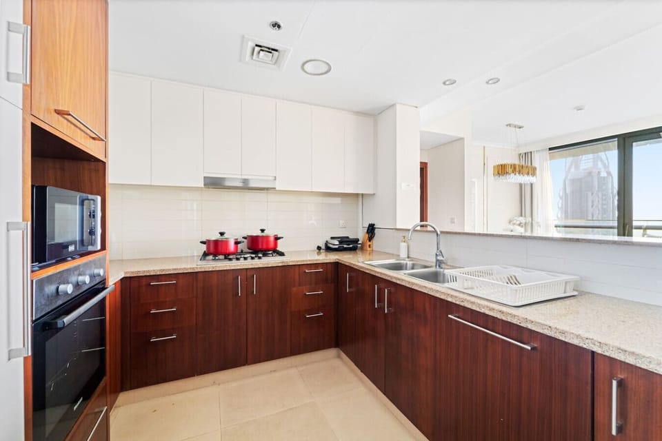 Chef`s Paradise: Sleek kitchen with modern appliances and stunning views to inspire your culinary adventures!