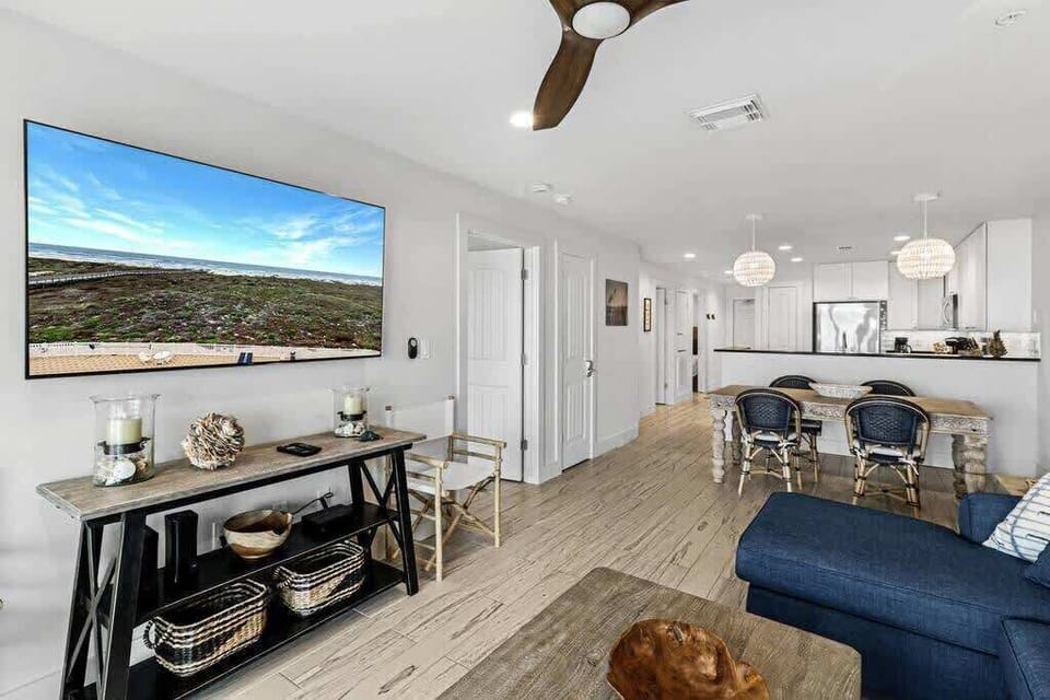 Relax and Unwind: Enjoy Cable TV Entertainment with Breathtaking Views of the Gulf Coast from Your Living Room