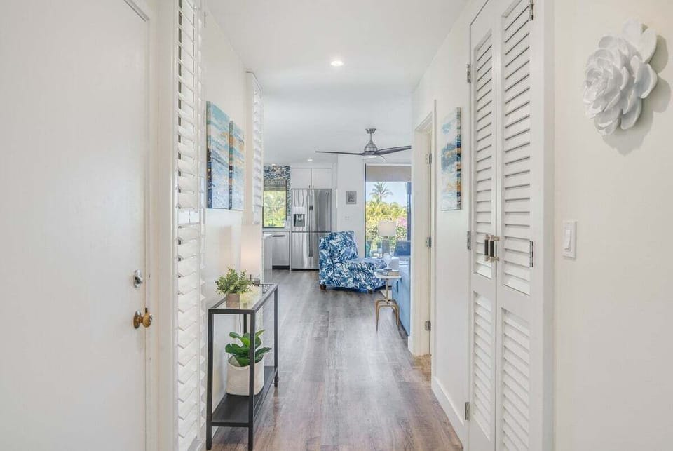 Walk hallways styled with coastal chairs and light.