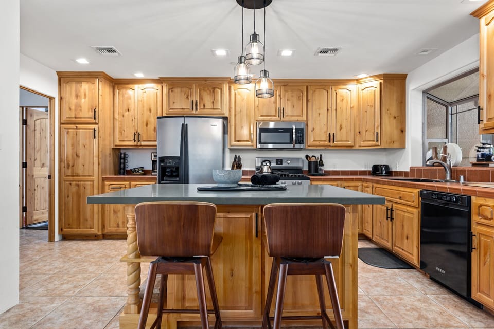 Open kitchen equipped with appliances