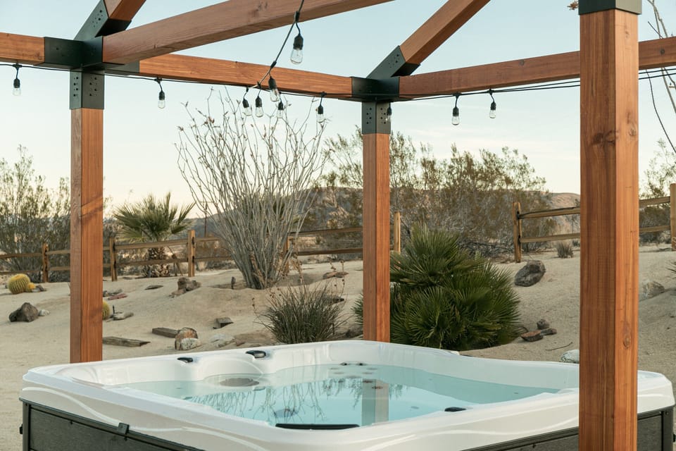 Relax in the hot tub while enjoying the view