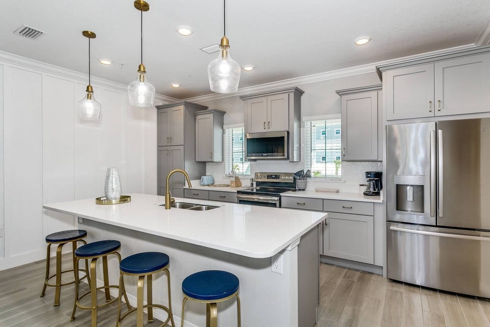 Modern kitchen supplied with what you'll need to cook up family meals