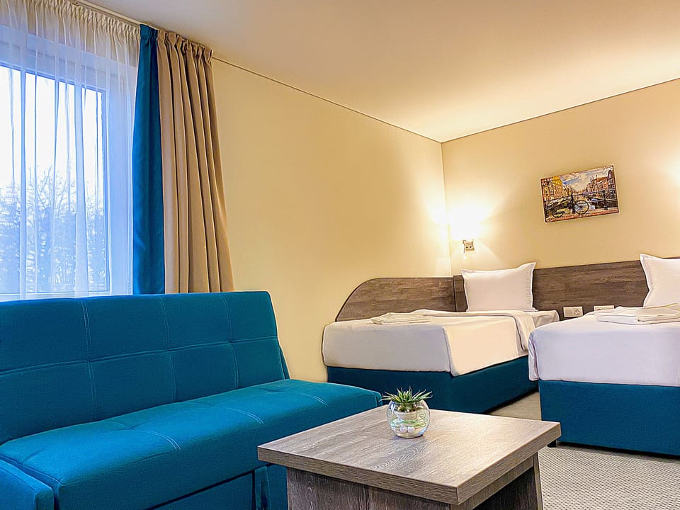 Desk, laptop workspace, free WiFi, bed sheets