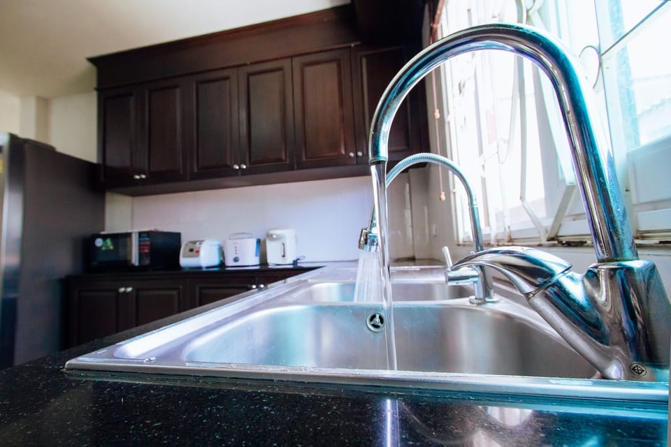 Villa | Private kitchen | Fridge, microwave, oven, stovetop