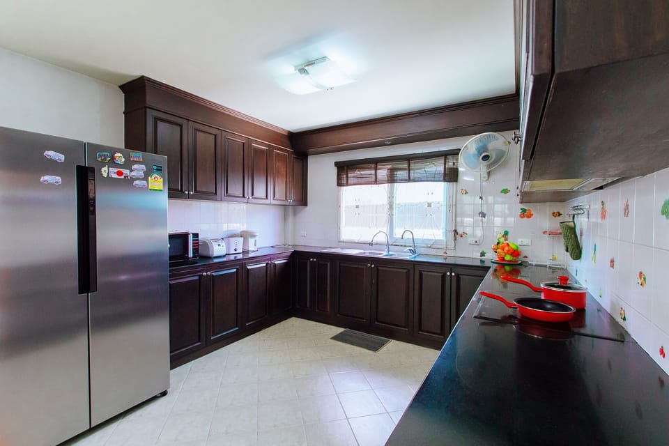 Villa | Private kitchen | Fridge, microwave, oven, stovetop