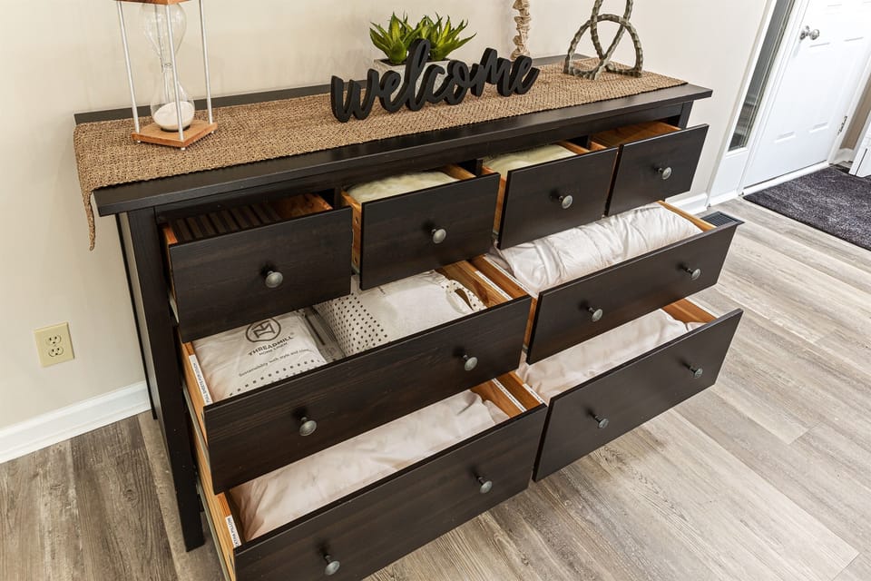 Large dresser for linen storage for the full convertible sofa bed.