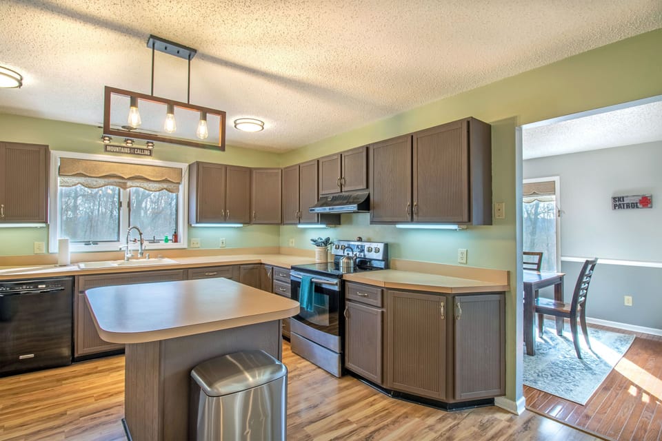 Full kitchen with stove top, oven, microwave, refrigerator, dishwasher, and more!
