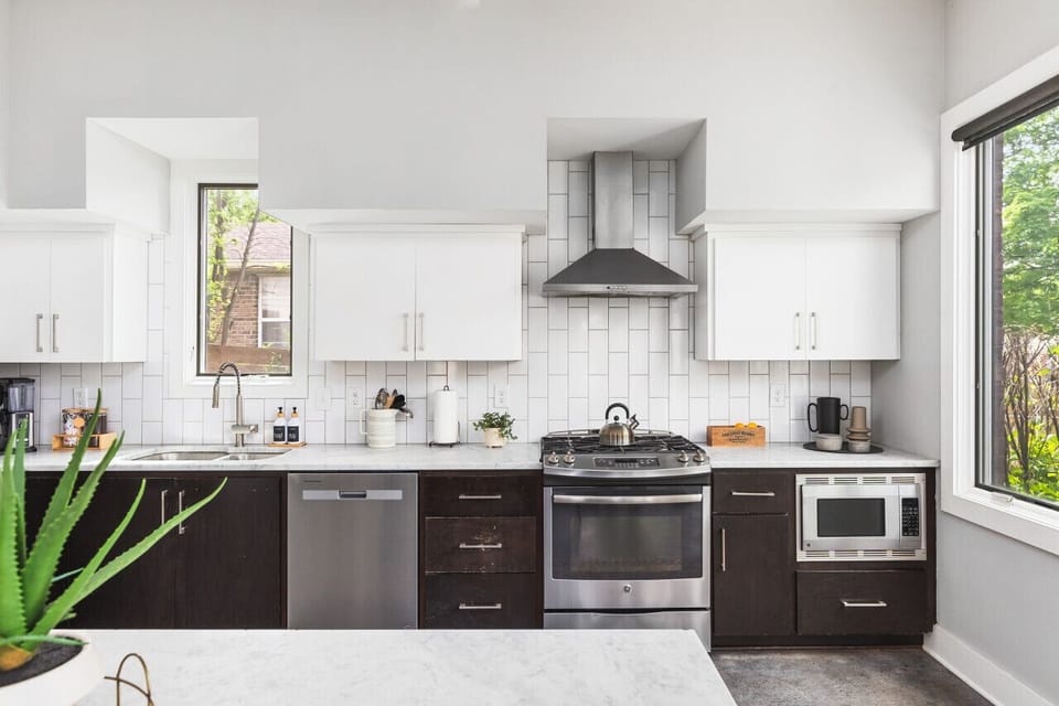 Spacious kitchen that is fully equipped for all of your cooking needs. Seating for three at the counter.