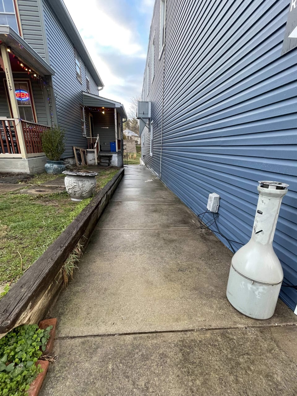 Sidewalk to the back parking area