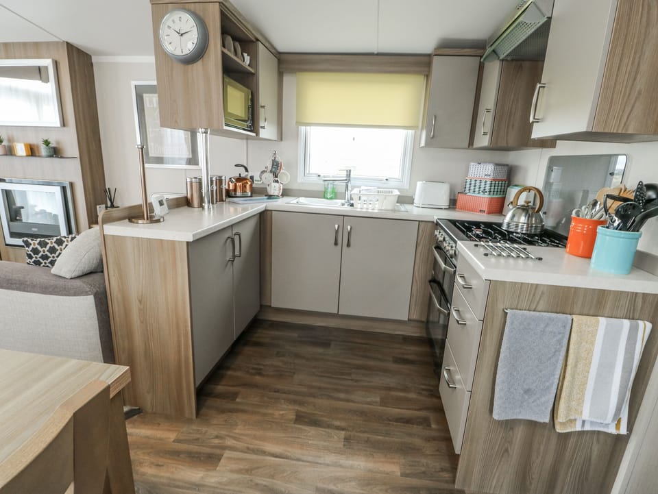 Fridge, microwave, electric kettle, toaster