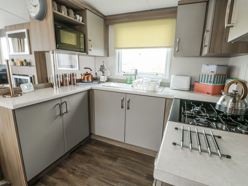 Fridge, microwave, electric kettle, toaster