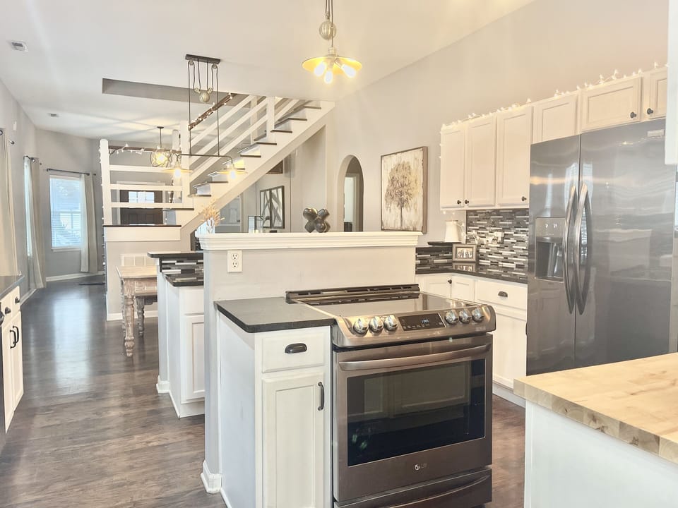 Updated appliances and fully stocked kitchen