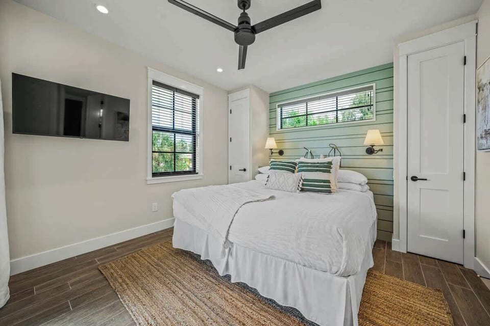 Master Bedroom 1-King Bed, TV, En Suite Bath, Balcony Access
