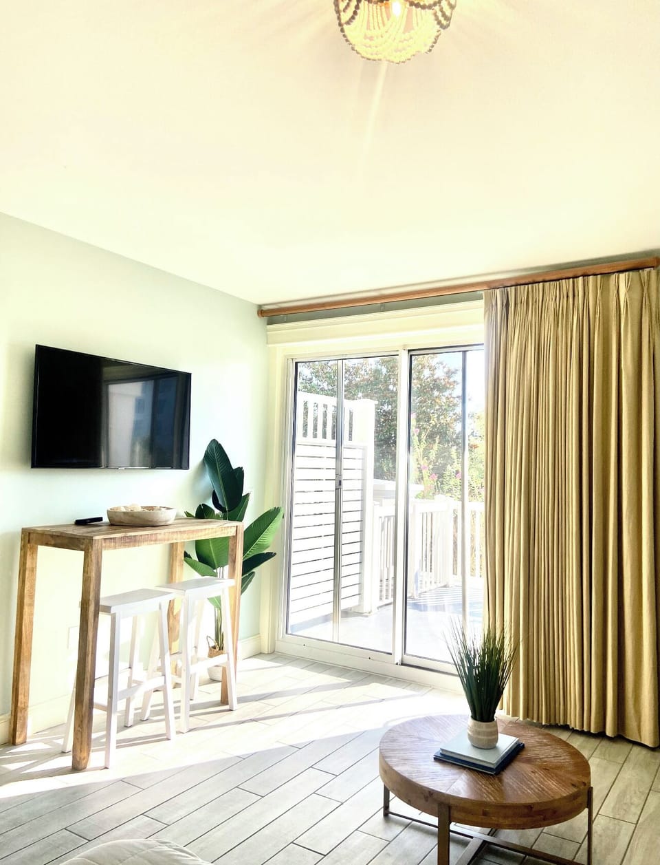 View, looking from bedroom area out to the patio door