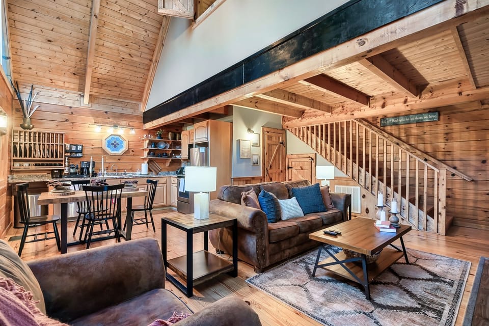 Get ready to relax and recharge in our living room featuring a cozy sleeper sofa, inviting electric fireplace, and smart Roku TV for streaming all your favorite shows.
