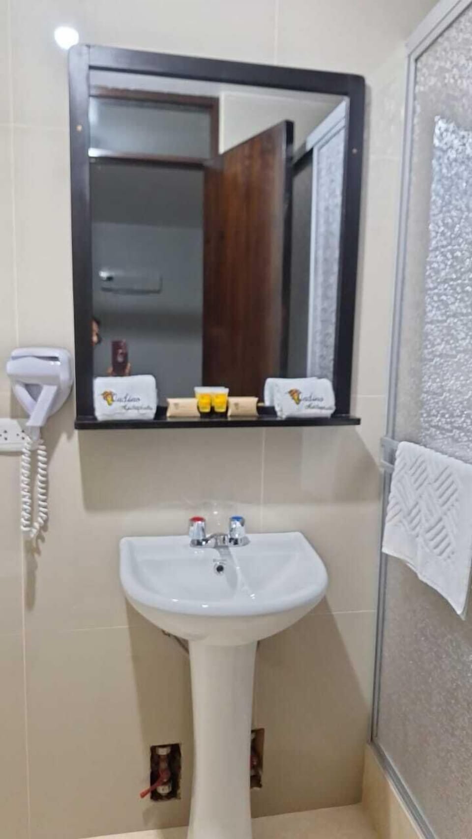 Rainfall showerhead, designer toiletries, hair dryer, bathrobes