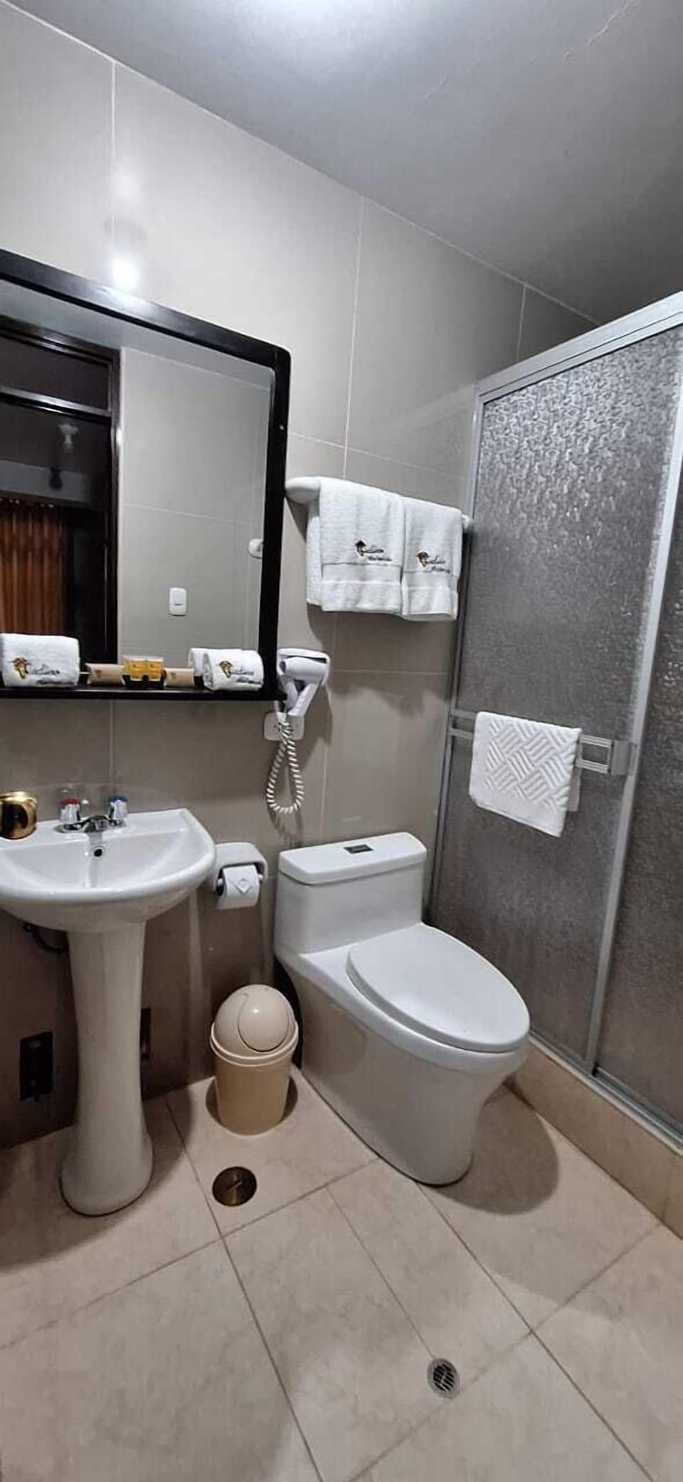 Rainfall showerhead, designer toiletries, hair dryer, bathrobes