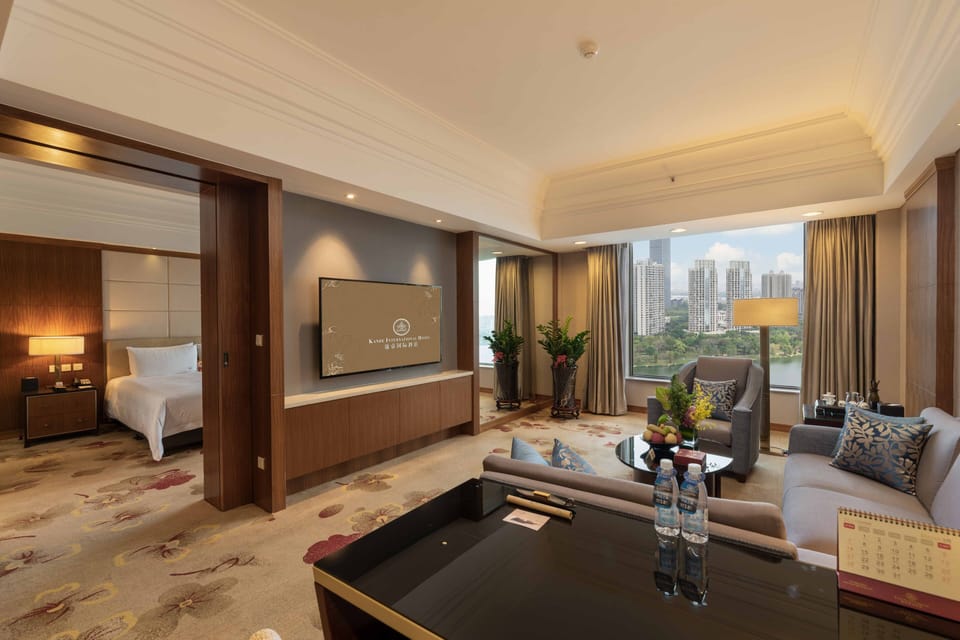 Executive Suite, 1 King Bed, River View | Living room | 50-inch LCD TV with satellite channels, TV, pay movies