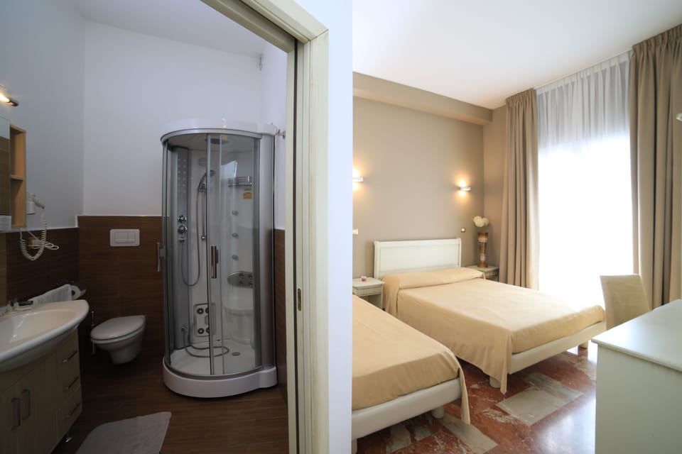 Double Room | Minibar, in-room safe, individually decorated, individually furnished