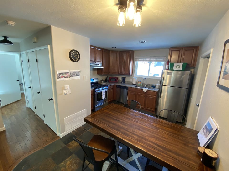 Open kitchen with high top table dining area- all open to our living room. 
