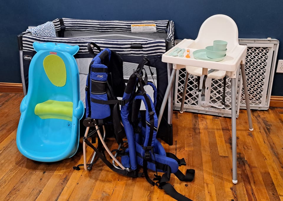 Baby and toddler gear is provided, stored in the laundry room. (plus step stool)