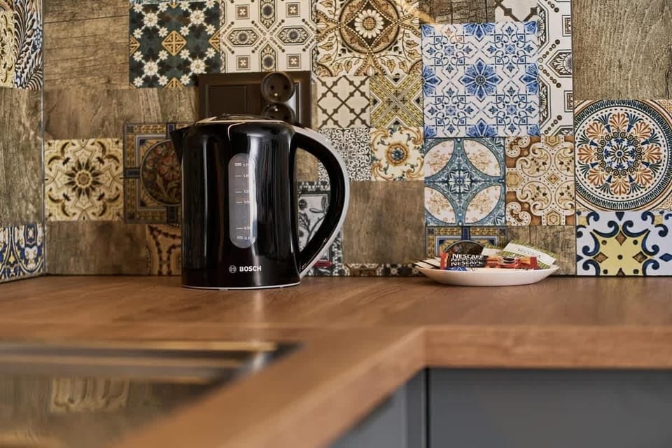 A closer look at the kitchen counter and cabinets, showcasing elegant finishes and spacious surfaces.