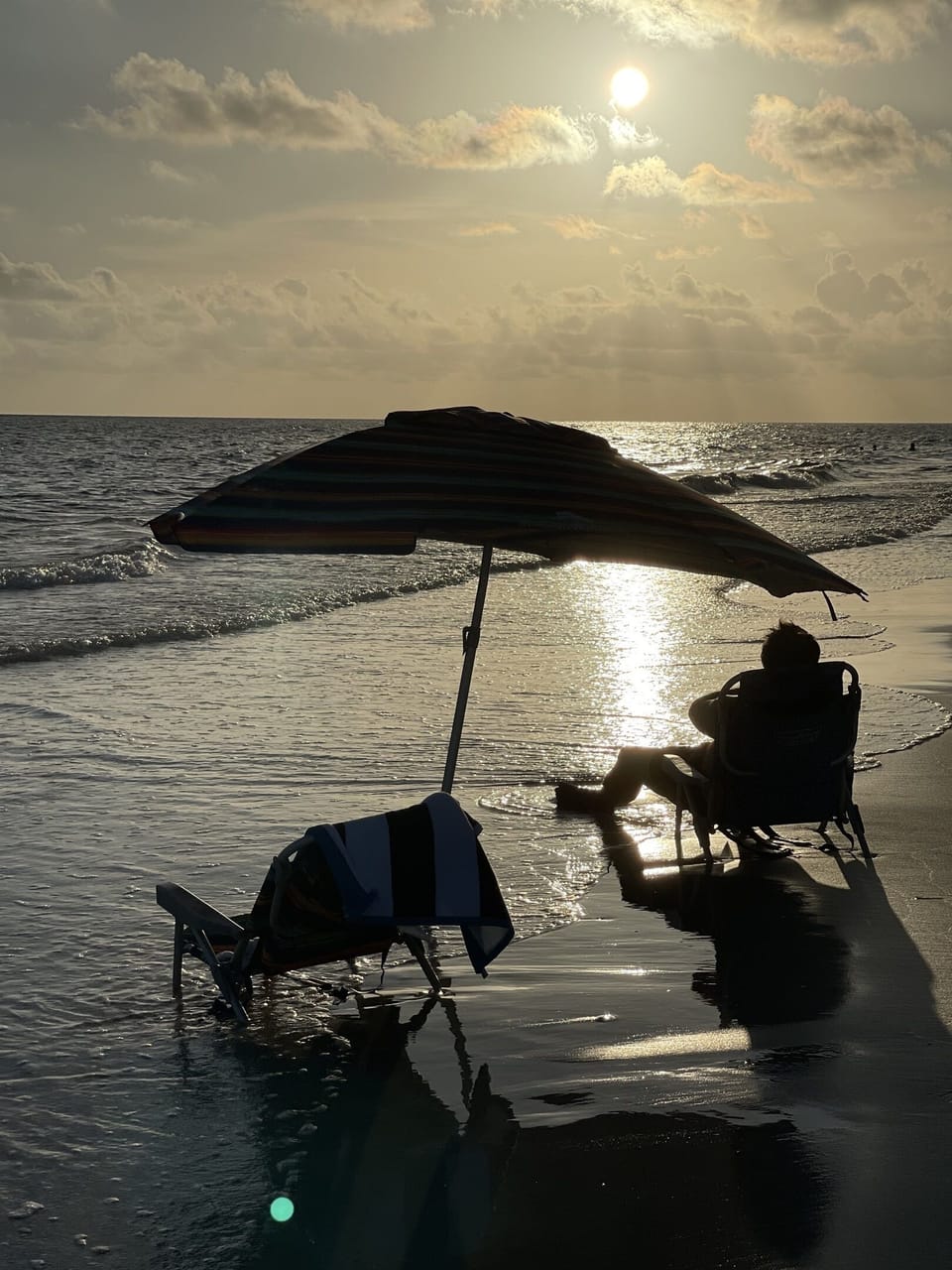 Relaxing by the ocean is what beach vacations are made of. Beach chairs and umbrellas included.